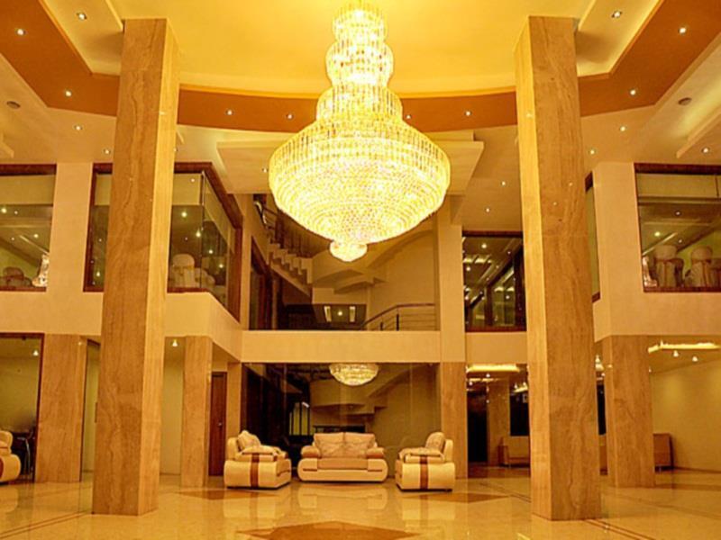 Hotel The Evergrand Palace Rajkot Bagian luar foto